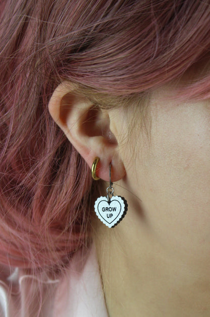 "Grow Up" Loveheart Huggie Hoop Earrings - Silver